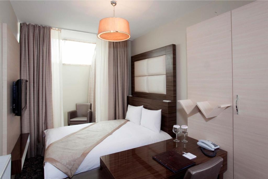 Derpa Hotel Стамбул Номер фото